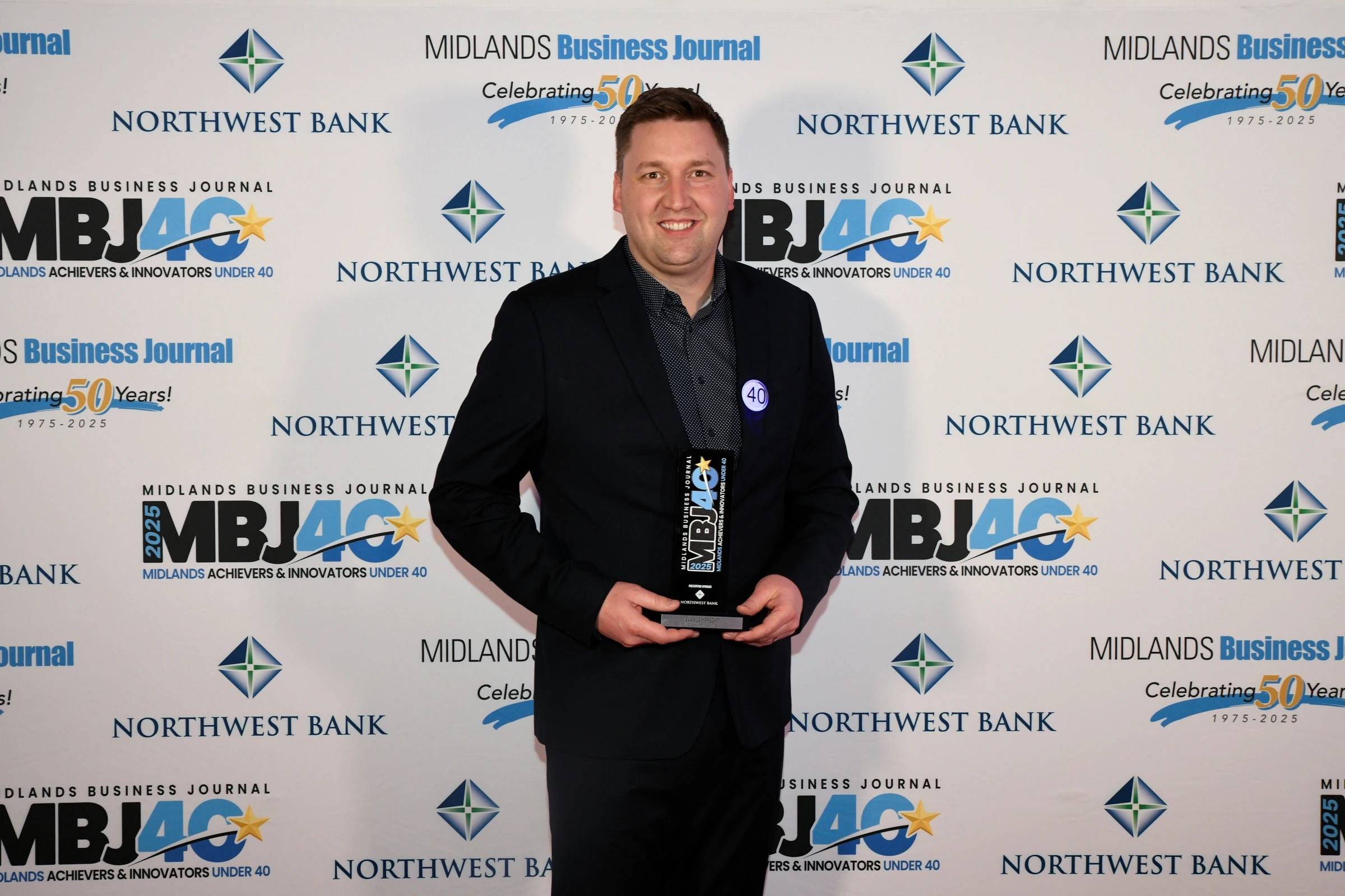 Evan Lamprecht Named to MBJ’s 2025 40 Under 40